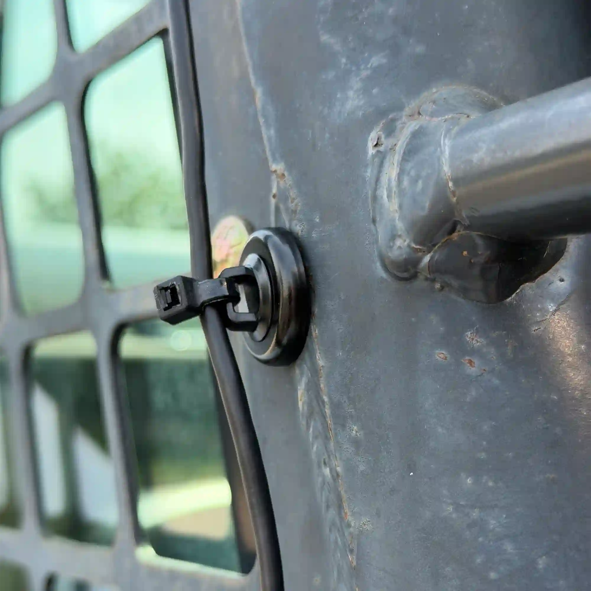 magdaddy magnetic tie mount securing cat grade control system to bull dozer